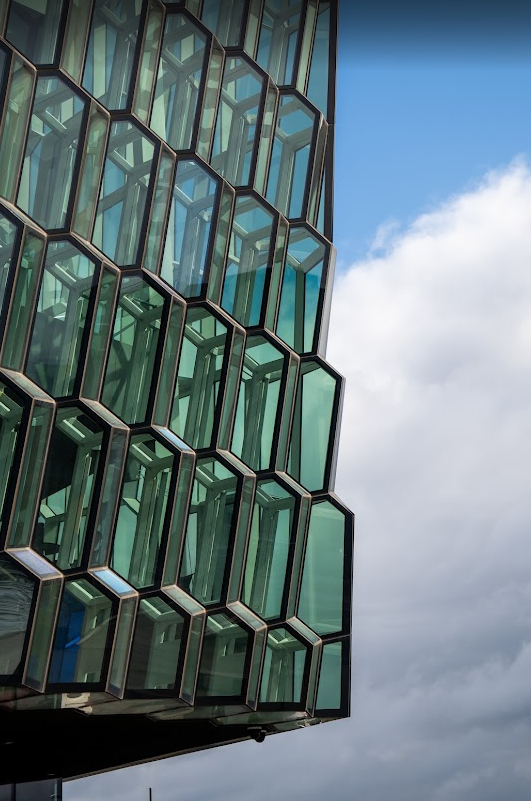 geometric windows against sky